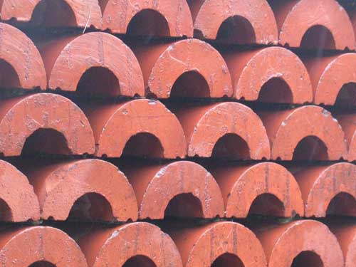 Wall made from half pipes Wall made from half pipes