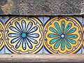 Floral rosette tiles