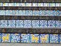 Steps with tiles of beasts, decorative designs and faces