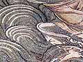 Detail of mosaic technique used in waves and water