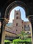 A tower at the west end of the cathedral, seen through an arch