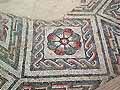 Guilloche and rose pattern in a geometric mosaic