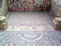 An alcove with mosaic floor