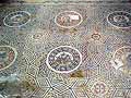 Mosaic floor featuring emblems various fruits