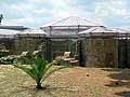 Outside of the bath rooms, with a modern roof